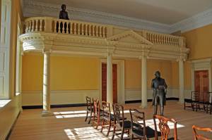 The Old Senate Chamber as it would have appeared on December 23, 1783 during the resignation ceremony of General George Washington. The gallery has been recreated based on historic photographs, physical evidence, and documentary records.